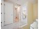 Well-lit hallway with view into bedroom at 5667 W 109Th Cir, Westminster, CO 80020