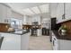 Bright, airy kitchen with stainless steel appliances, granite countertops, and ample cabinet space at 5667 W 109Th Cir, Westminster, CO 80020
