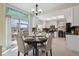 Open kitchen featuring an eat-in dining area and exterior access, and stainless steel appliances at 5667 W 109Th Cir, Westminster, CO 80020