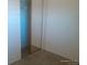 A bedroom closet with bi-fold doors, a shelf, and clothes rod at 10762 E Exposition Ave. Ave # 137, Aurora, CO 80012