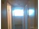 A bright hallway with doors leading to other rooms in the house at 10762 E Exposition Ave. Ave # 137, Aurora, CO 80012