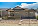 Home with a nice back porch, and a rock ground covering, plus neutral siding and trim at 16277 Talons Bluff Ln, Monument, CO 80132