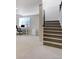 Finished basement featuring an office space and carpeted stairs at 16277 Talons Bluff Ln, Monument, CO 80132