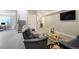 Finished basement features a wet bar, living area, and carpeted stairs at 16277 Talons Bluff Ln, Monument, CO 80132