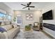 Inviting living room showcases comfortable seating, fireplace, and stylish decor for relaxation at 16277 Talons Bluff Ln, Monument, CO 80132