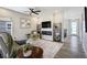 Cozy living room features modern fireplace, stylish furnishings, and abundant natural light at 16277 Talons Bluff Ln, Monument, CO 80132