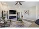 Bright living room with contemporary décor, fireplace, and open layout at 16277 Talons Bluff Ln, Monument, CO 80132