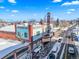 Aerial view of a historic building, possibly a theater, on a street at 4383 Tennyson St # 1A, Denver, CO 80212