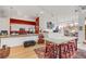 Modern kitchen with red accents and ample counter space at 4383 Tennyson St # 1A, Denver, CO 80212