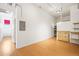 Bright office space with wood floors and built-in shelving at 4383 Tennyson St # 1A, Denver, CO 80212