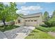 Charming single-Gathering home with an attached garage, mature tree, and well-manicured lawn at 2420 E 127Th Ave, Thornton, CO 80241