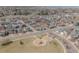 Aerial view of a neighborhood and nearby playground in a residential area at 869 Bluestem Ln, Louisville, CO 80027