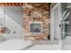 An outdoor fireplace constructed of brick creates a unique and welcoming space at 869 Bluestem Ln, Louisville, CO 80027