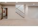 Open basement area, showcasing a staircase and wine cellar for added convenience and elegance at 869 Bluestem Ln, Louisville, CO 80027