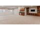 Finished basement featuring a wet bar, built-in cabinets, and entertainment area at 869 Bluestem Ln, Louisville, CO 80027