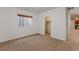 Bright bedroom featuring a window, closet, and neutral-toned carpet for a cozy feel at 869 Bluestem Ln, Louisville, CO 80027