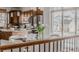 Kitchen and dining area that features dark cabinets, stainless steel appliances, and lots of natural light at 869 Bluestem Ln, Louisville, CO 80027