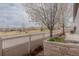 Home exterior view of manicured lawn and nearby neighborhood playground at 869 Bluestem Ln, Louisville, CO 80027
