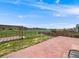 Well-maintained backyard featuring a patio, pergola, and a fenced yard with green grass at 16448 E 111Th Pl, Commerce City, CO 80022
