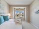 Bedroom with a large window that lets in plenty of natural light with a queen size bed at 16448 E 111Th Pl, Commerce City, CO 80022