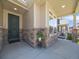 Charming front porch with stone accents, cozy design, and an inviting entrance with black door at 16448 E 111Th Pl, Commerce City, CO 80022
