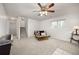 Spacious finished basement featuring carpeted floors, ample lighting, and staircase access at 1245 Ceres Dr, Lafayette, CO 80026