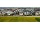 Expansive aerial view of the neighborhood, highlighting the community's layout and abundant greenery at 5831 Galena St, Denver, CO 80238