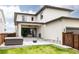Modern home exterior with covered patio, hot tub, and outdoor dining area for upscale outdoor living at 5831 Galena St, Denver, CO 80238
