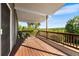 Enjoy the outdoors from this covered back deck with ample space for seating at 5115 Bristol St, Arvada, CO 80002