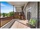 Enjoy outdoor living on this covered back deck at 5115 Bristol St, Arvada, CO 80002