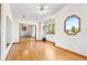 Spacious bedroom with hardwood floors and large windows for natural light at 5115 Bristol St, Arvada, CO 80002