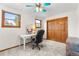 This bedroom is the perfect place for a home office at 5115 Bristol St, Arvada, CO 80002