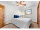 Relax in this cozy bedroom with a ceiling fan at 5115 Bristol St, Arvada, CO 80002