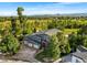 Beautiful single-Gathering home with attached three car garage surrounded by lush greenery at 5115 Bristol St, Arvada, CO 80002