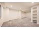 Basement featuring carpet floors, neutral walls and shelving for storage and decorations at 10672 Wintersweet Pl, Parker, CO 80134
