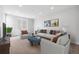 Bright living room features recessed lighting, neutral paint, and carpeted floors at 11261 Moonshimmer St, Littleton, CO 80125