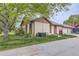 Charming single Gathering home with stucco siding and a well-maintained front yard at 671 Brentwood St, Lakewood, CO 80214