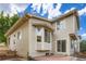 Expansive backyard showcasing the home's siding and a brick patio at 10626 Cherrybrook Cir, Highlands Ranch, CO 80126