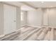 Finished basement features new flooring and a white door at 10626 Cherrybrook Cir, Highlands Ranch, CO 80126