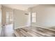 Bright and airy room with modern flooring, fresh paint, white trim, and ample natural light at 10626 Cherrybrook Cir, Highlands Ranch, CO 80126