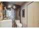 Modern bathroom with geometric tile accent wall, floating vanity, and a contemporary design at 1863 Wazee St # 6B, Denver, CO 80202