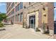 Charming building entrance with potted plants and classic architectural details at 1863 Wazee St # 6B, Denver, CO 80202