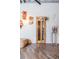 Hallway with custom artwork and a classic telephone booth at 1863 Wazee St # 6B, Denver, CO 80202