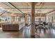 Spacious living area features exposed brick, high ceilings, and a stylish open layout for entertaining at 1863 Wazee St # 6B, Denver, CO 80202