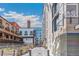 Outdoor alley with modern architecture, string lights, and vibrant decorations at 1863 Wazee St # 6B, Denver, CO 80202