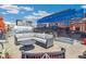 Relax on this rooftop patio with comfortable outdoor seating and partial building view at 1863 Wazee St # 6B, Denver, CO 80202