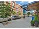 Street view of the building with a sidewalk, trees, and parked cars at 1863 Wazee St # 6B, Denver, CO 80202