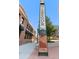 Street view of McGregor Square with brick buildings and the McGregor sign at 1863 Wazee St # 6B, Denver, CO 80202