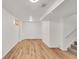 A spacious basement with neutral walls and wood-look flooring offers versatility and potential at 641 E 104Th Pl, Northglenn, CO 80233