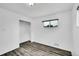 Simple bedroom design with a built-in closet and modern flooring at 641 E 104Th Pl, Northglenn, CO 80233